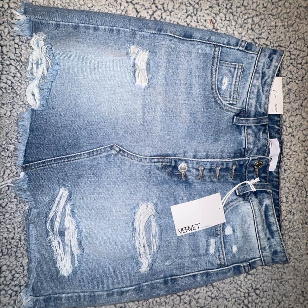 Women’s distressed denim skirt